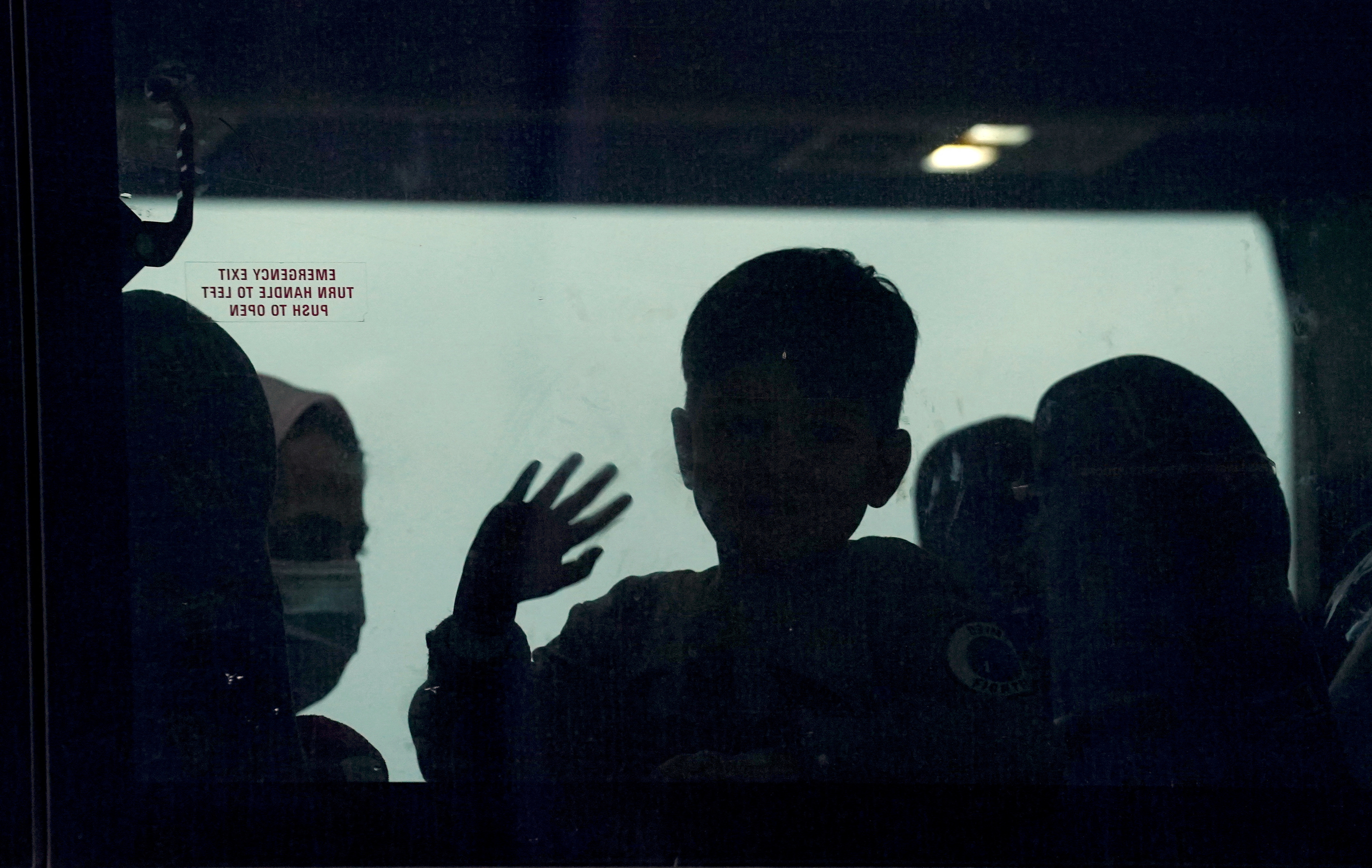 FILE PHOTO: Afghan refugees arrive at Dulles Airport in Virginia