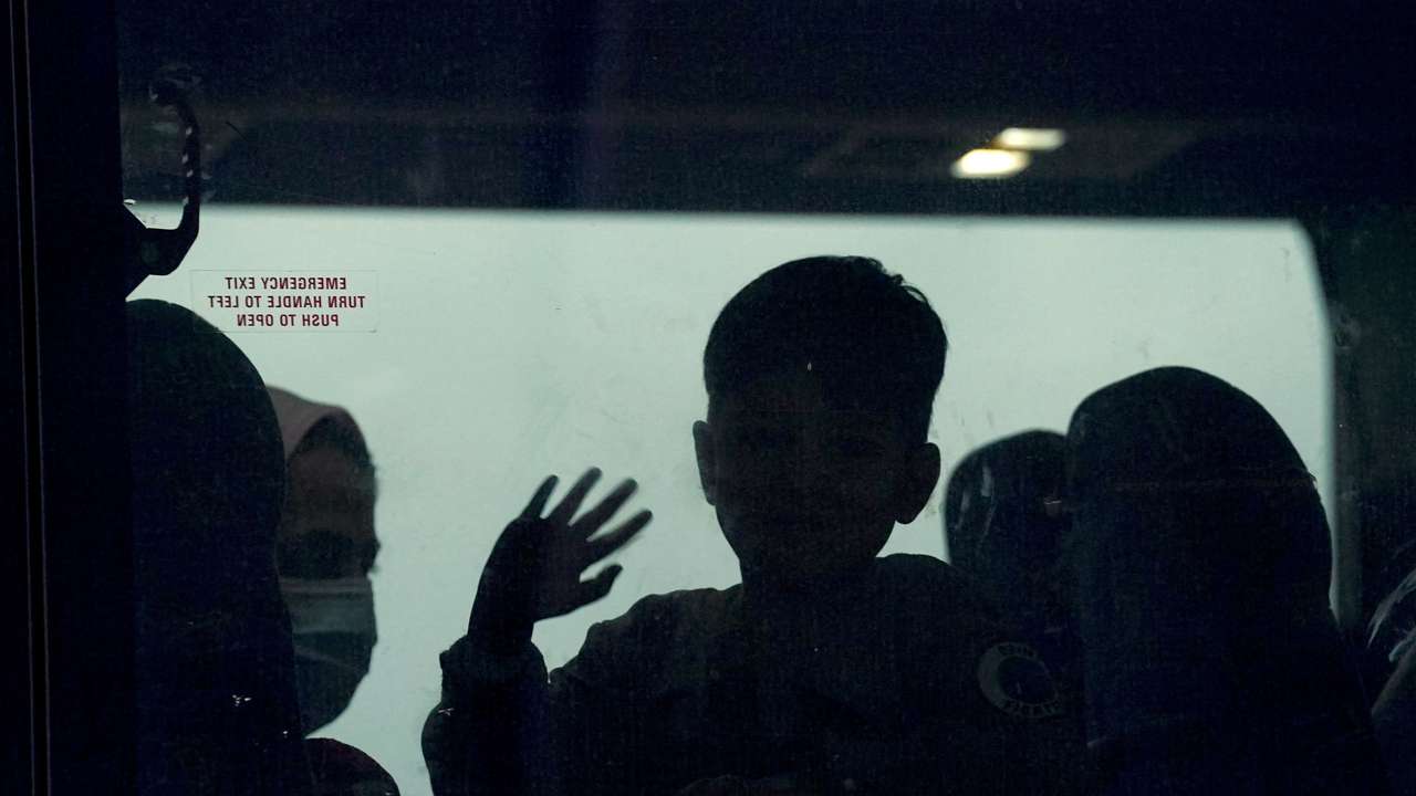 FILE PHOTO: Afghan refugees arrive at Dulles Airport in Virginia