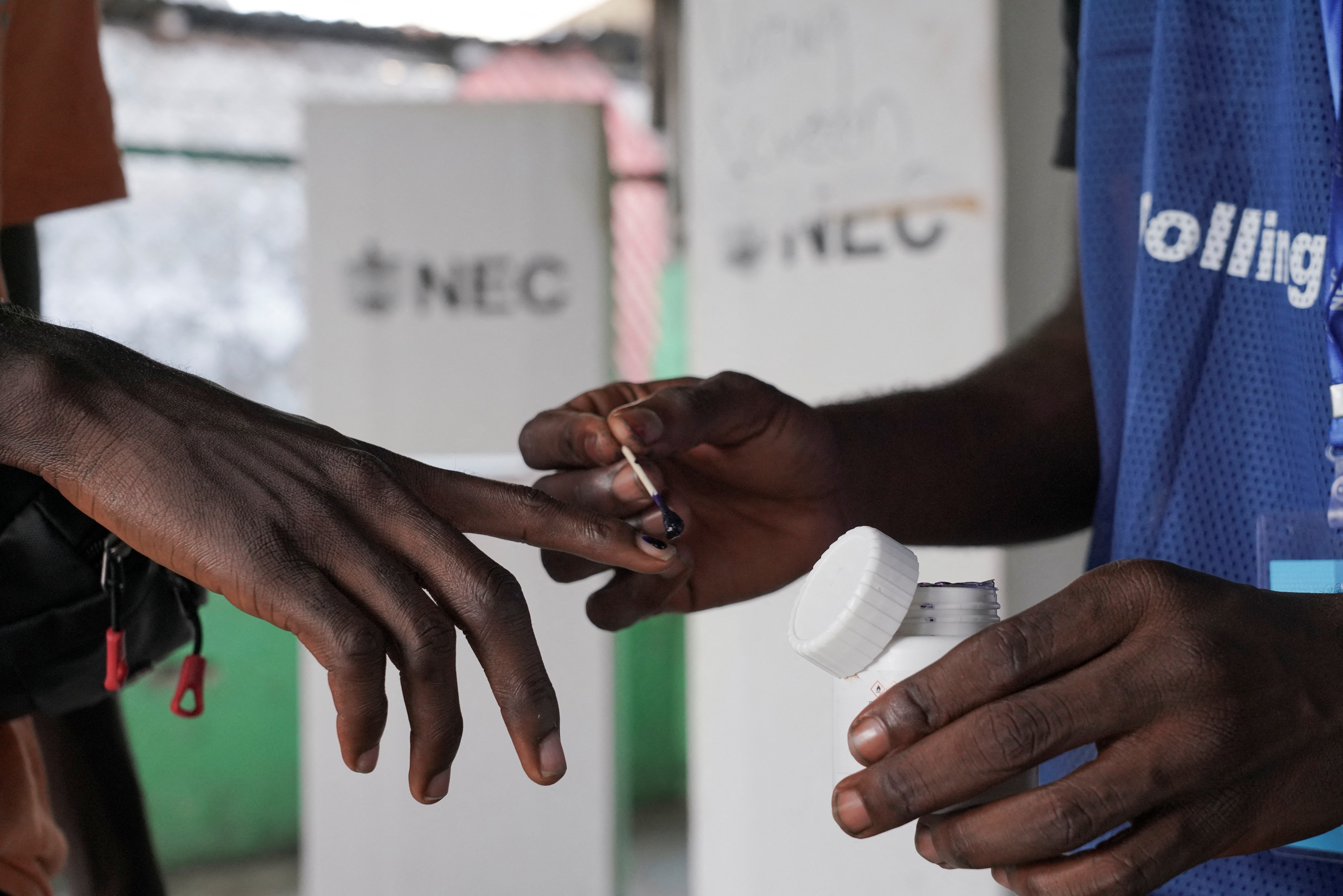 Liberians vote in tight presidential run-off