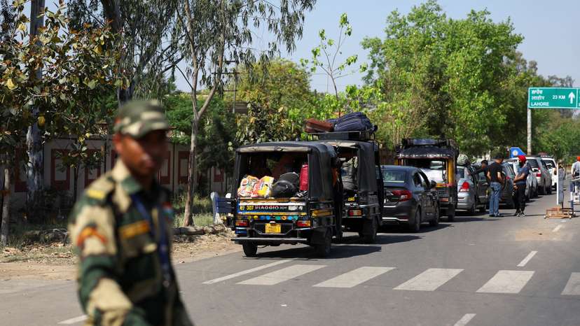 A military personnel with the Border Security Force (BSF) stands guard at the Attari-Wagah border