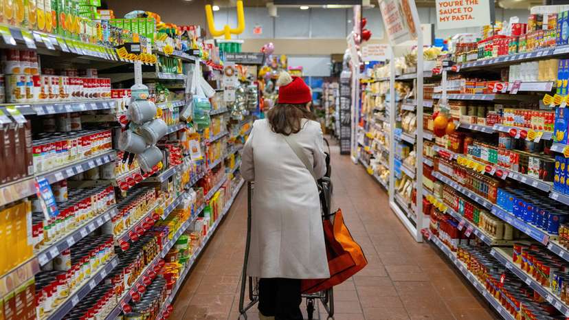 A person shops in a grocery store in Toronto