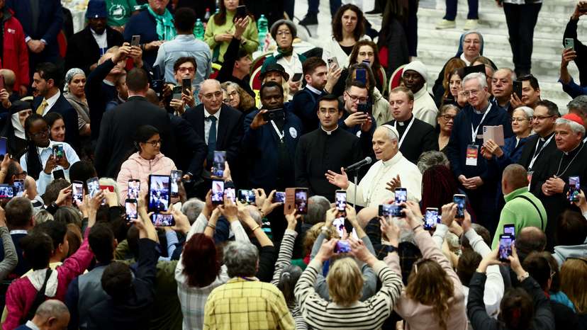 Pope Leo XIV attends a lunch with poor people in Paul VI Hall at the Vatican