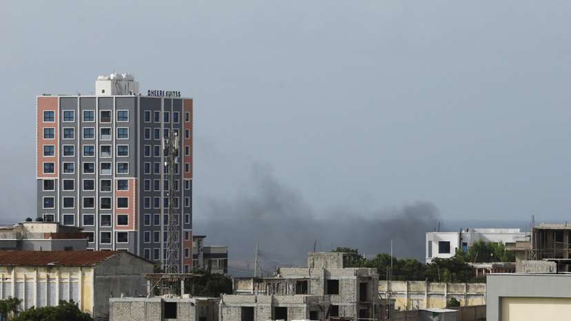 Smoke rises in the direction of Aden Adde airport following an African Union helicopter crash, in Mogadishu