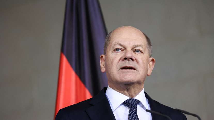 German Chancellor Scholz talks to reporters after confidence vote request submitted in Berlin
