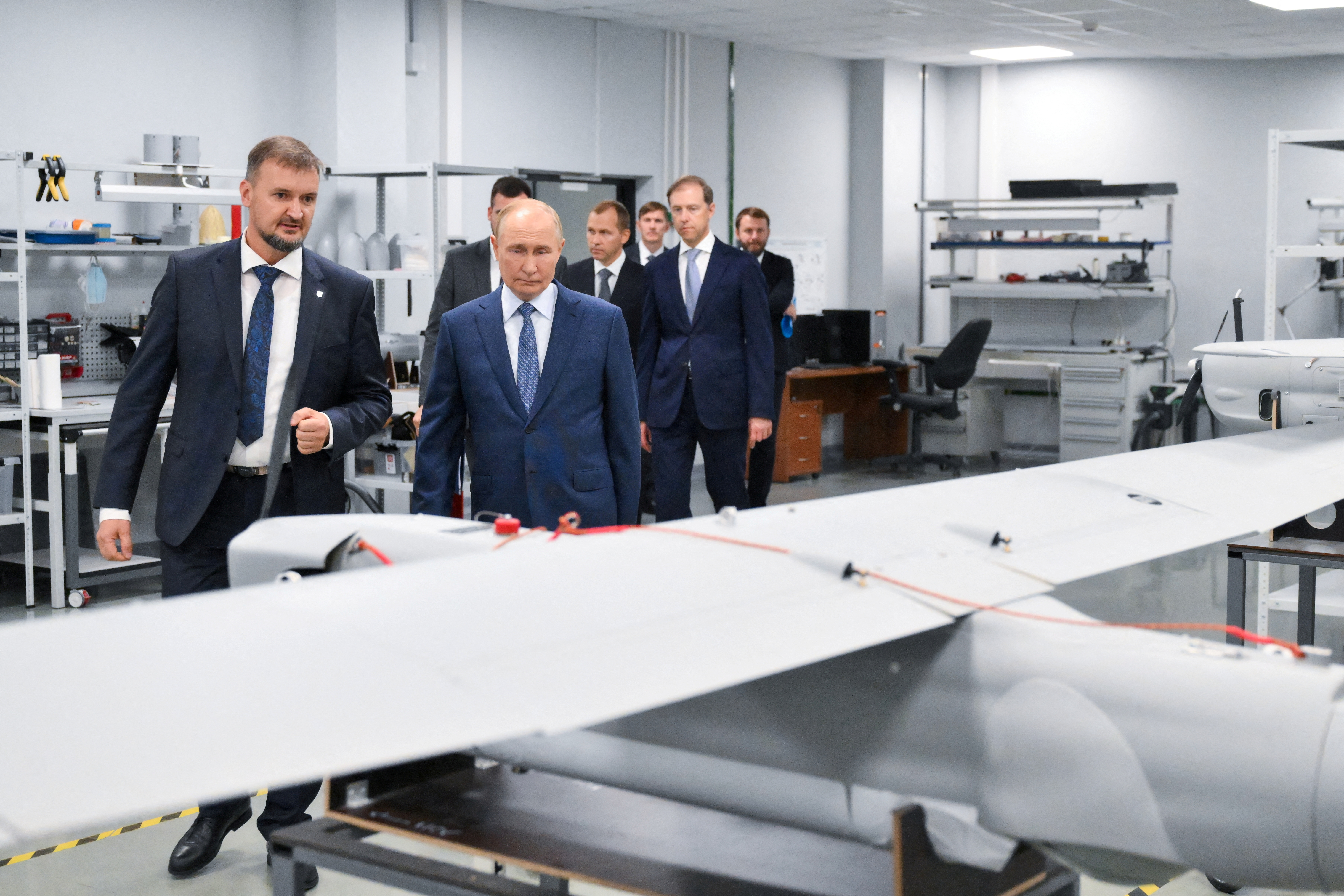 FILE PHOTO: Russia's President Vladimir Putin visits a drone production facility in Saint Petersburg
