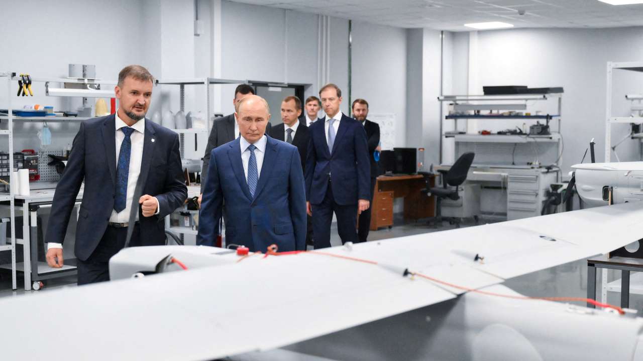 FILE PHOTO: Russia's President Vladimir Putin visits a drone production facility in Saint Petersburg