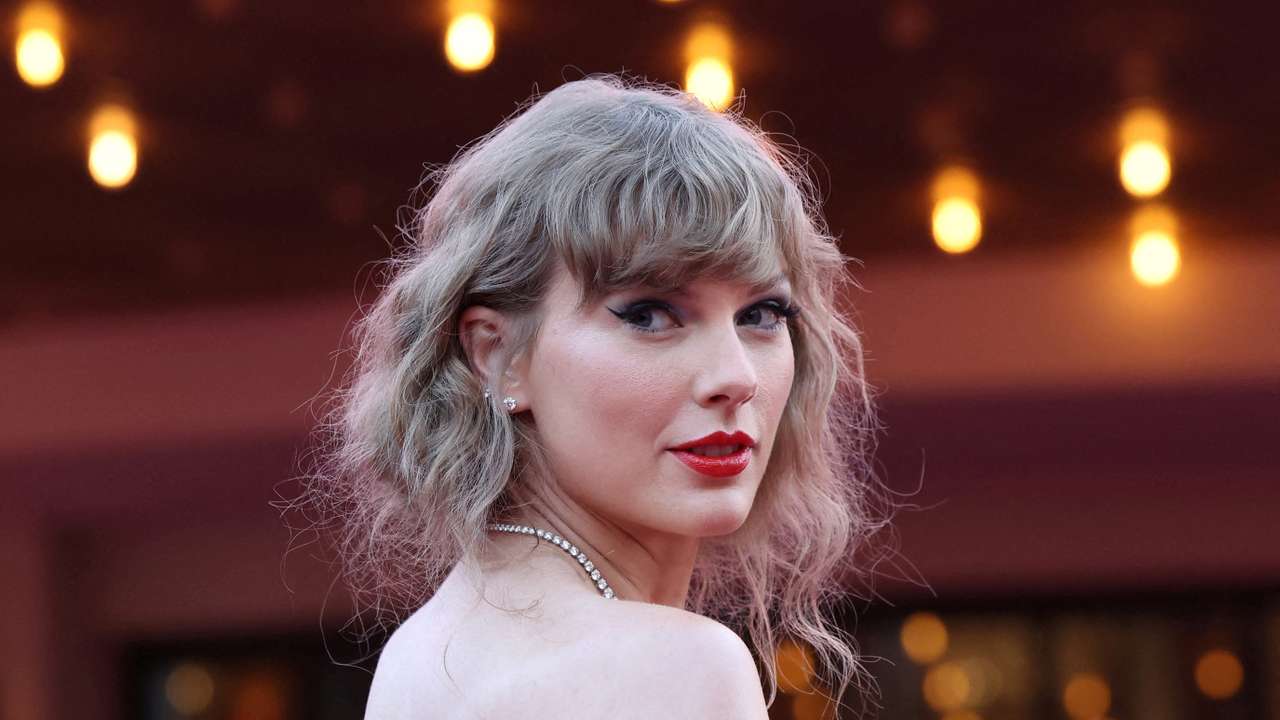FILE PHOTO: Taylor Swift attends a premiere for Taylor Swift: The Eras Tour in Los Angeles