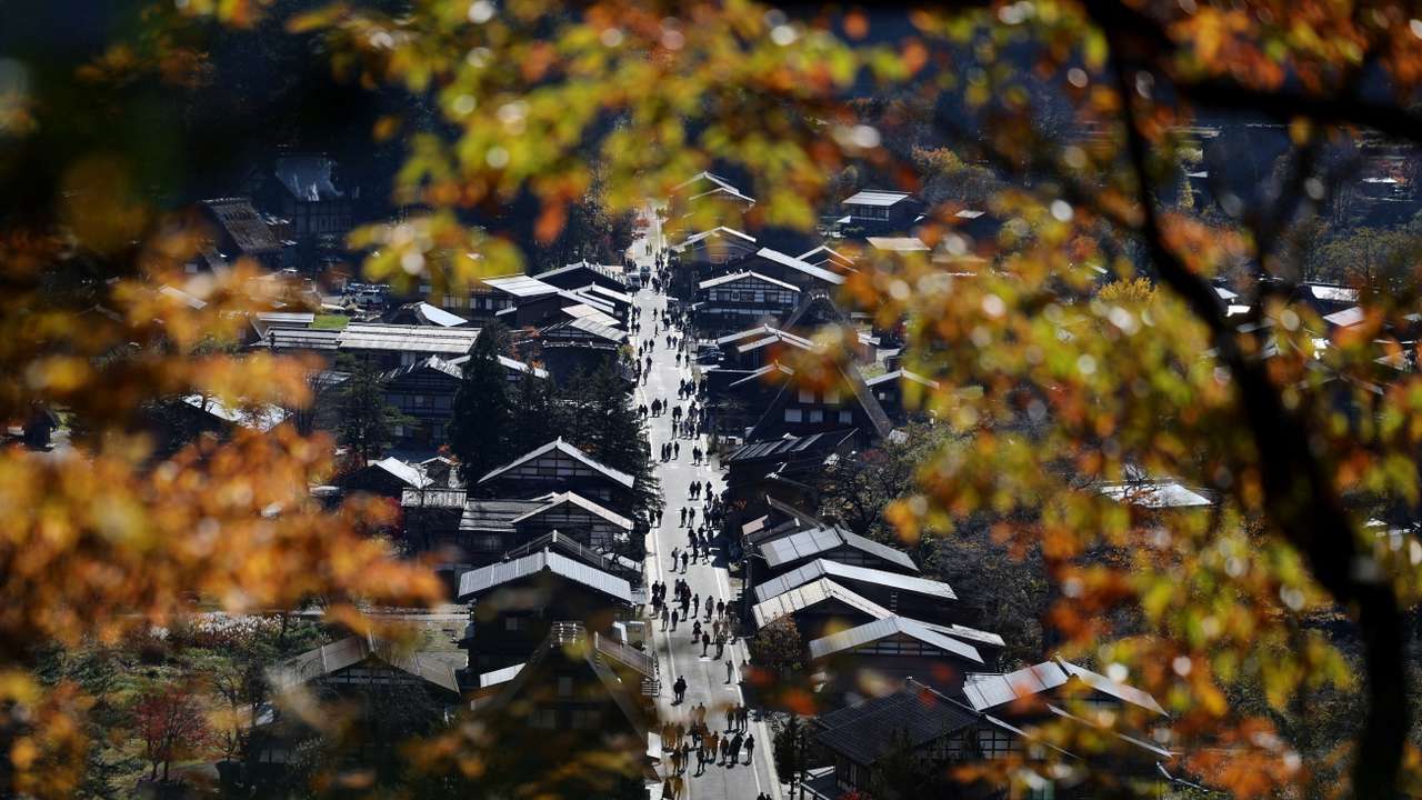 Visitors stroll at Shirakawa-go, in Shirakawa village
