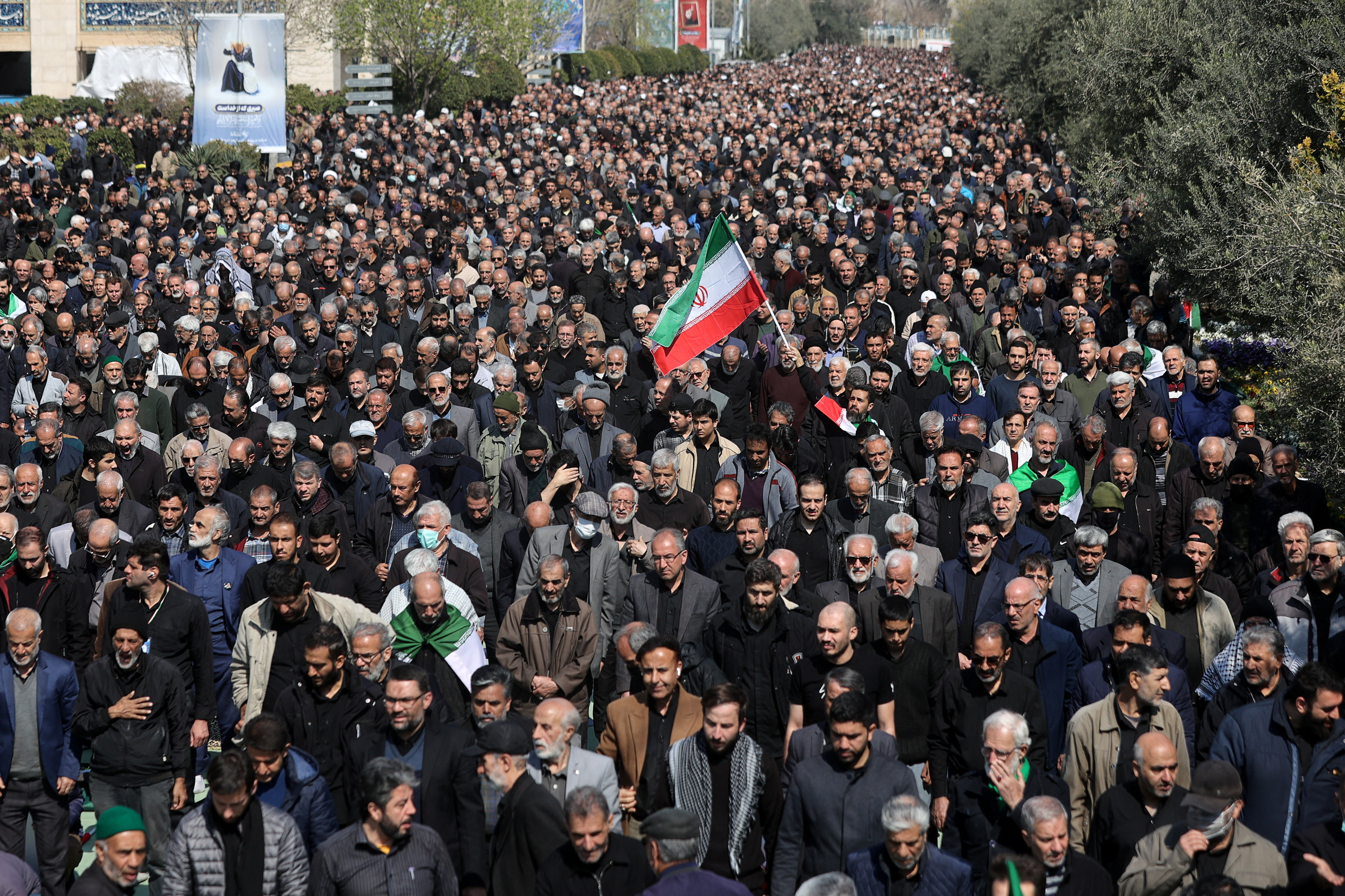People attend Friday prayer in Tehran