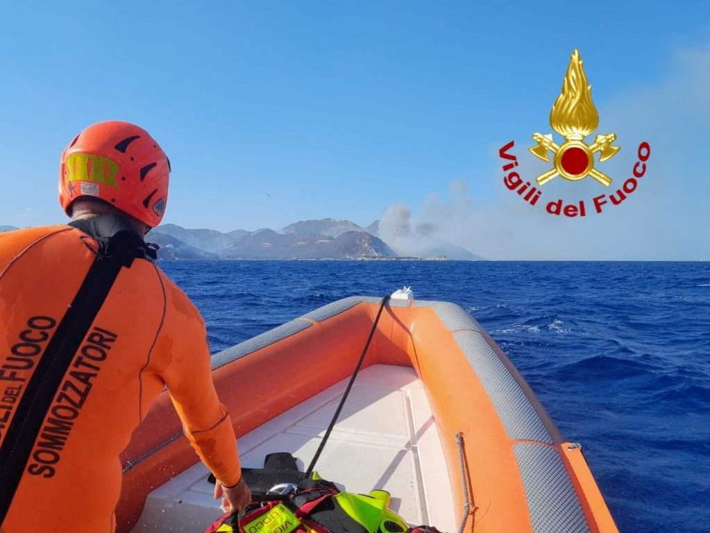 Firefighters battle vegetation fire off coastal town of Villasimius