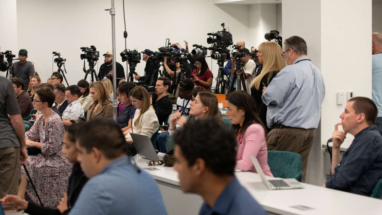 Members of the media listen to Maricopa County Election officials ahead of the presidential election in Phoenix