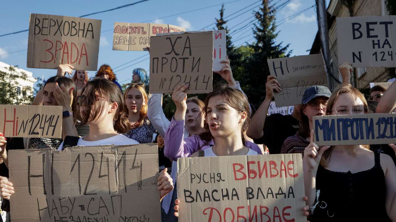 Ukrainians protest against a newly passed law, which curbs independence of anti-corruption institutions in Kharkiv