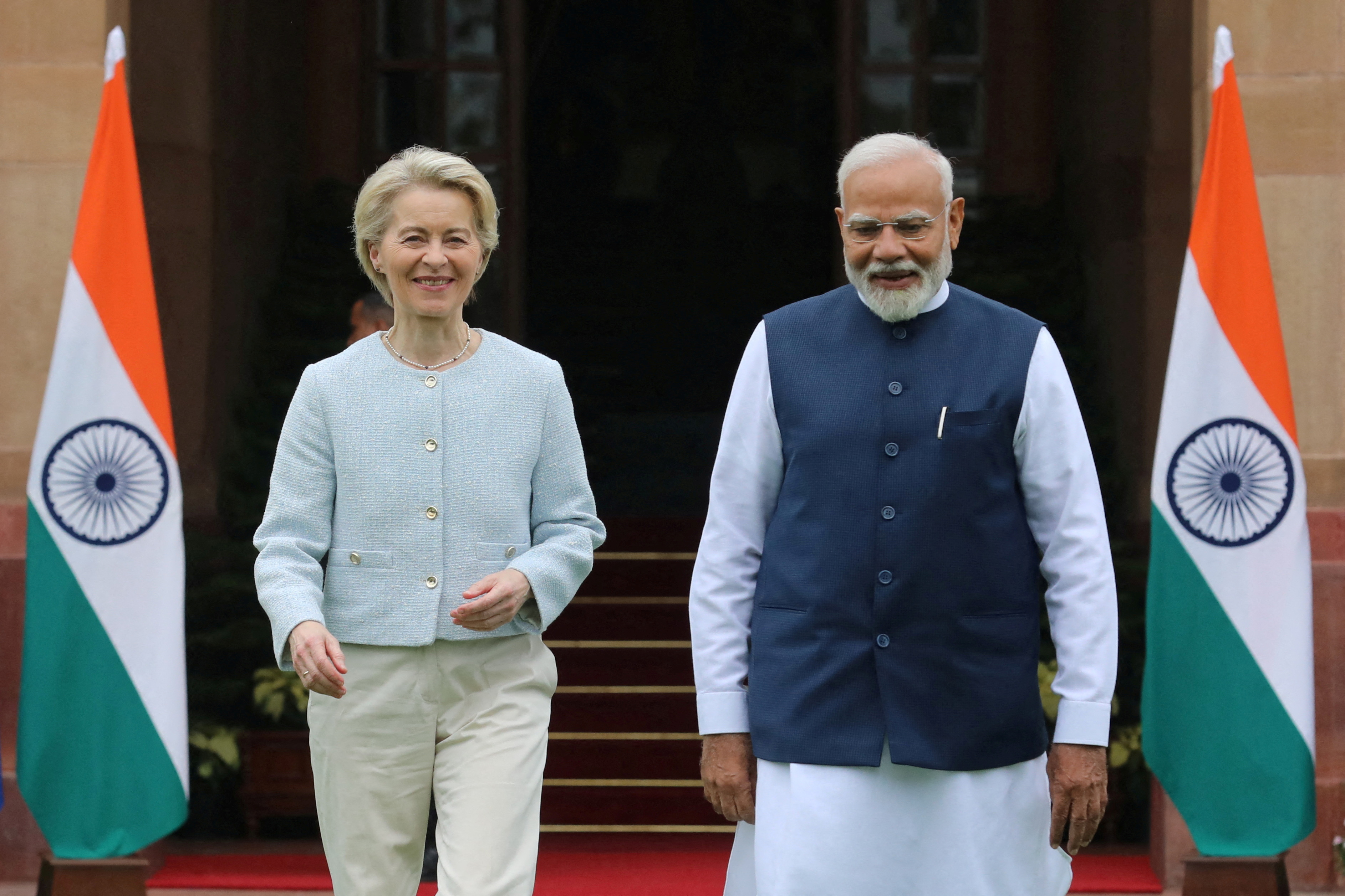 European Commission President Ursula von der Leyen and India's Prime Minister Narendra Modi arrive for a photo opportunity in New Delhi