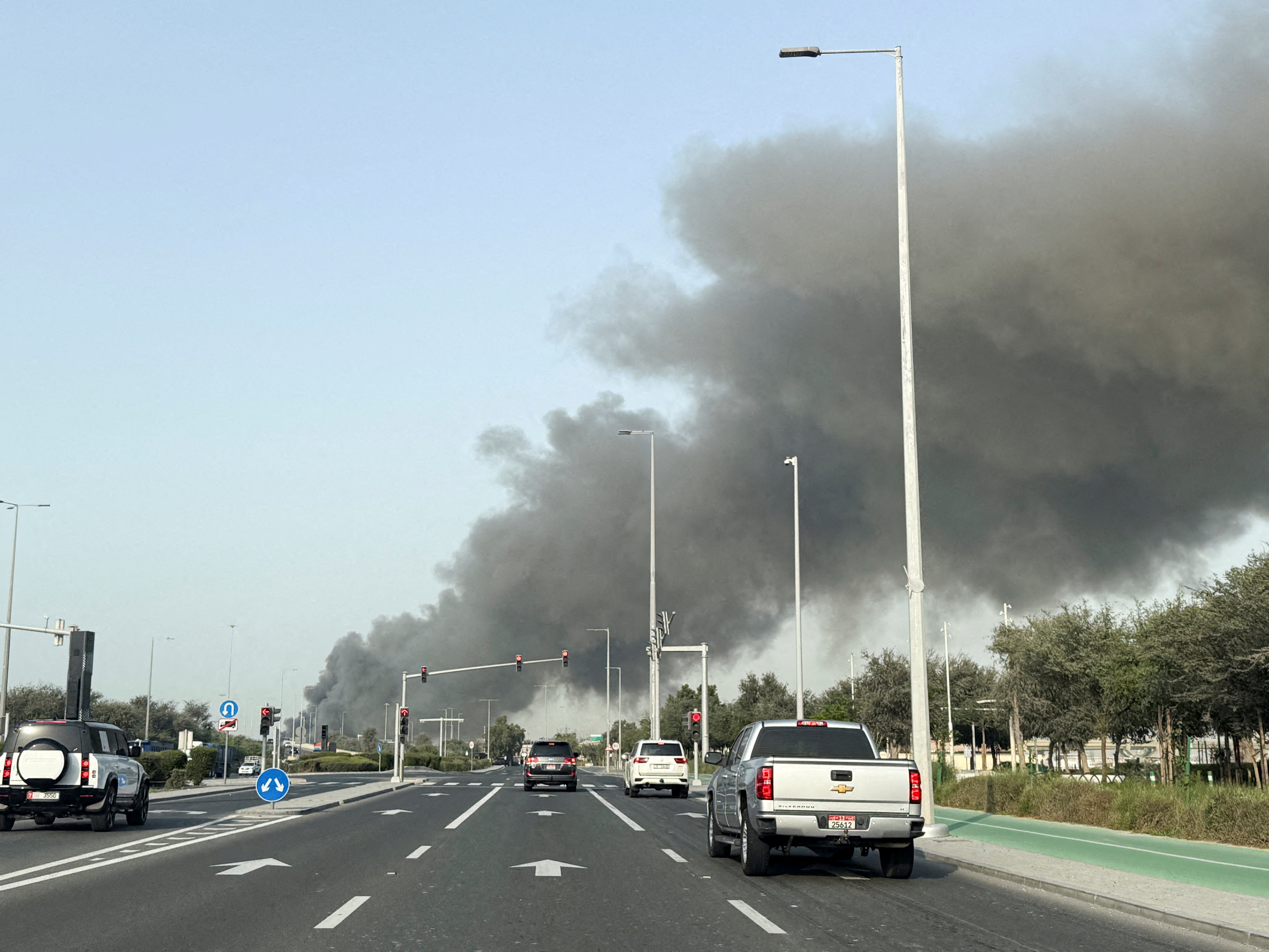 FILE PHOTO: Smoke billows from Zayed port after an Iranian attack, following United States and Israel strikes on Iran, in Abu Dhabi