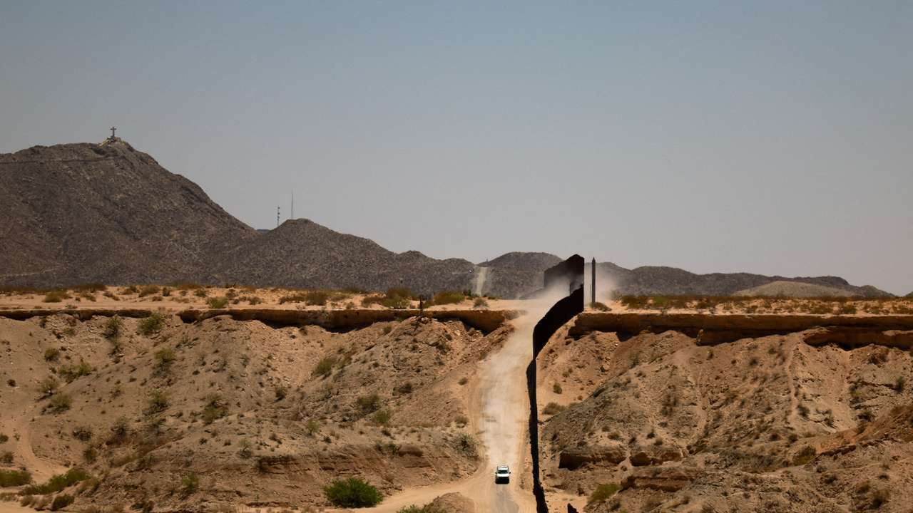 FILE PHOTO: Trump military zone blocks migrants, and Americans