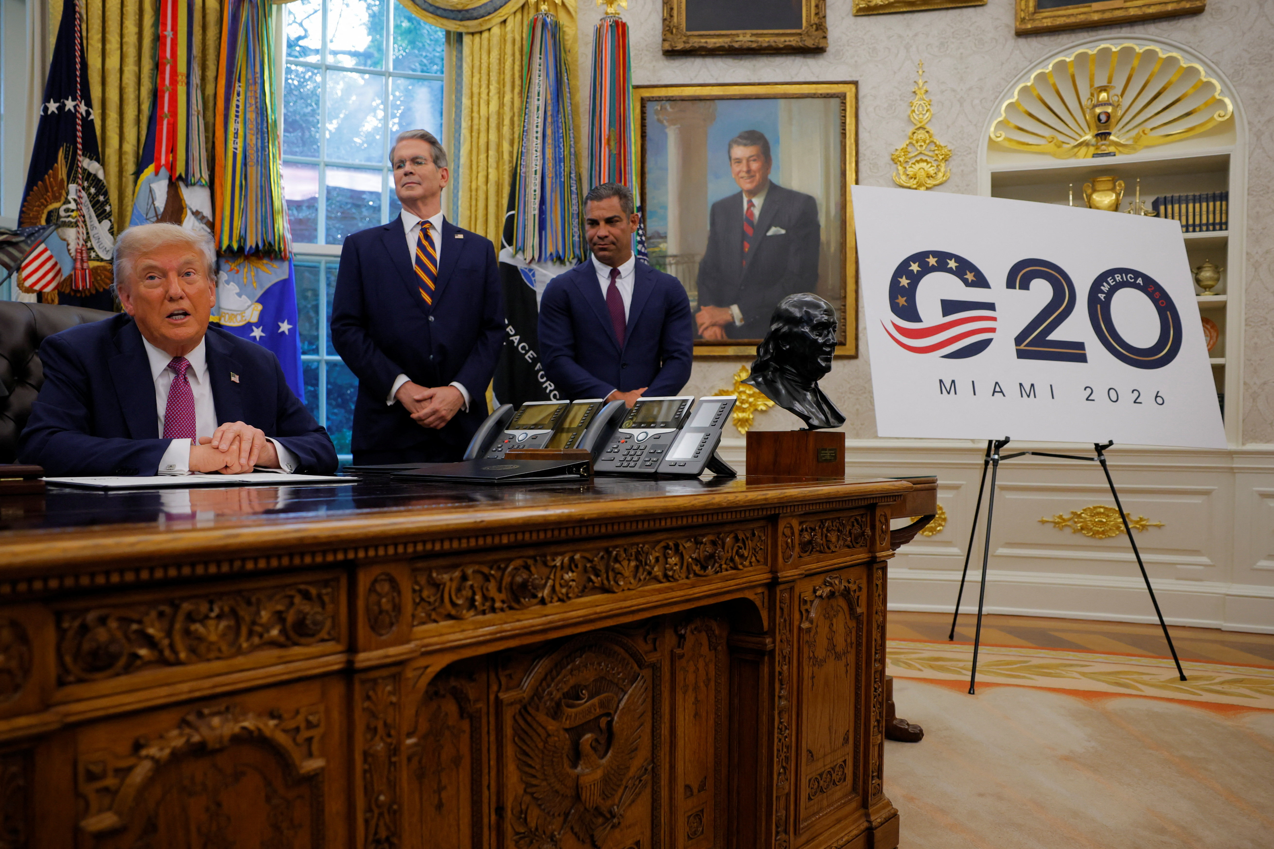 U.S. President Donald Trump signs an executive order at the White House in Washington, D.C.