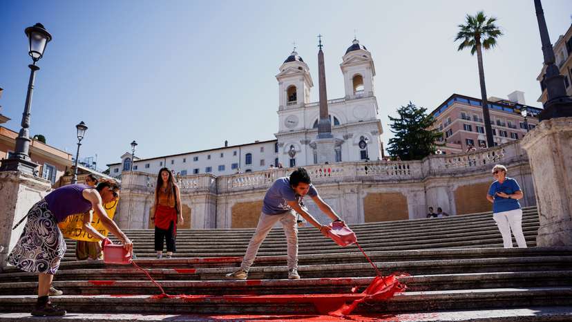 Activists pour red paint on the Spanish Steps to protest against femicides in Rome