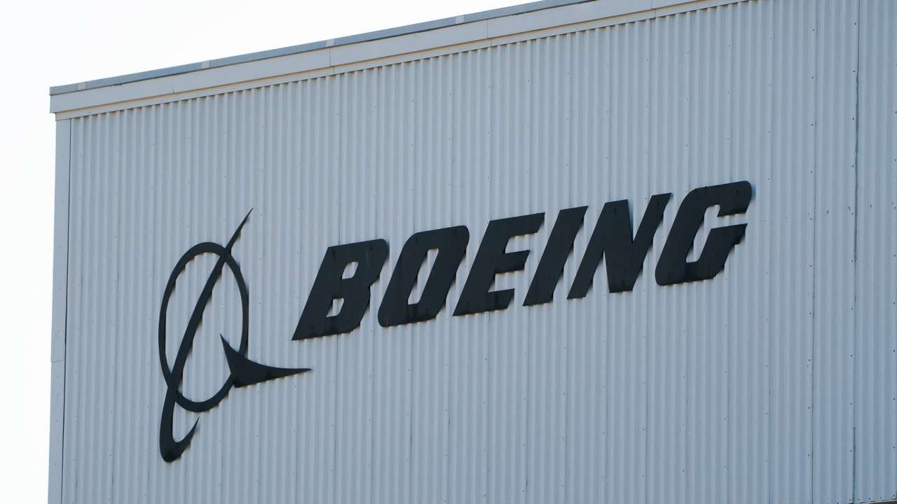 A Boeing sign sits on a building near Boeing Field, as trade tensions escalate over U.S. tariffs with China, in Seattle, Washington, U.S. April 22, 2025.  REUTERS/David Ryder