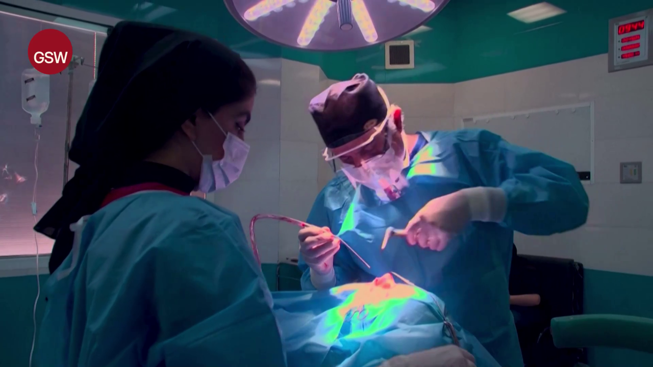 Dr. Hamidreza Hosnani, a prominent rhinoplasty surgeon in Tehran performing a nose job