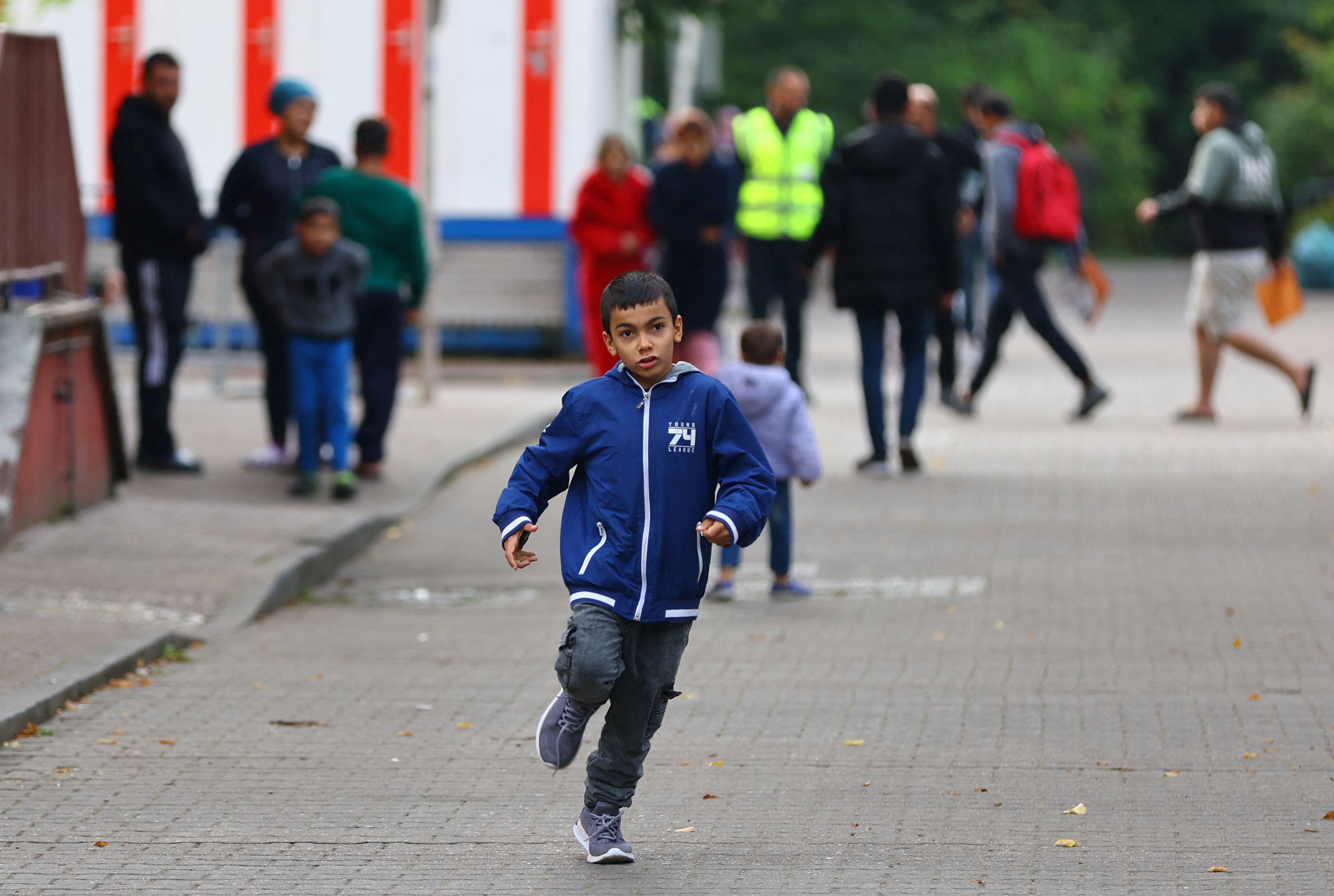 Migrants pictured at the arrival center for asylum seekers at Berlin's Reinickendorf district