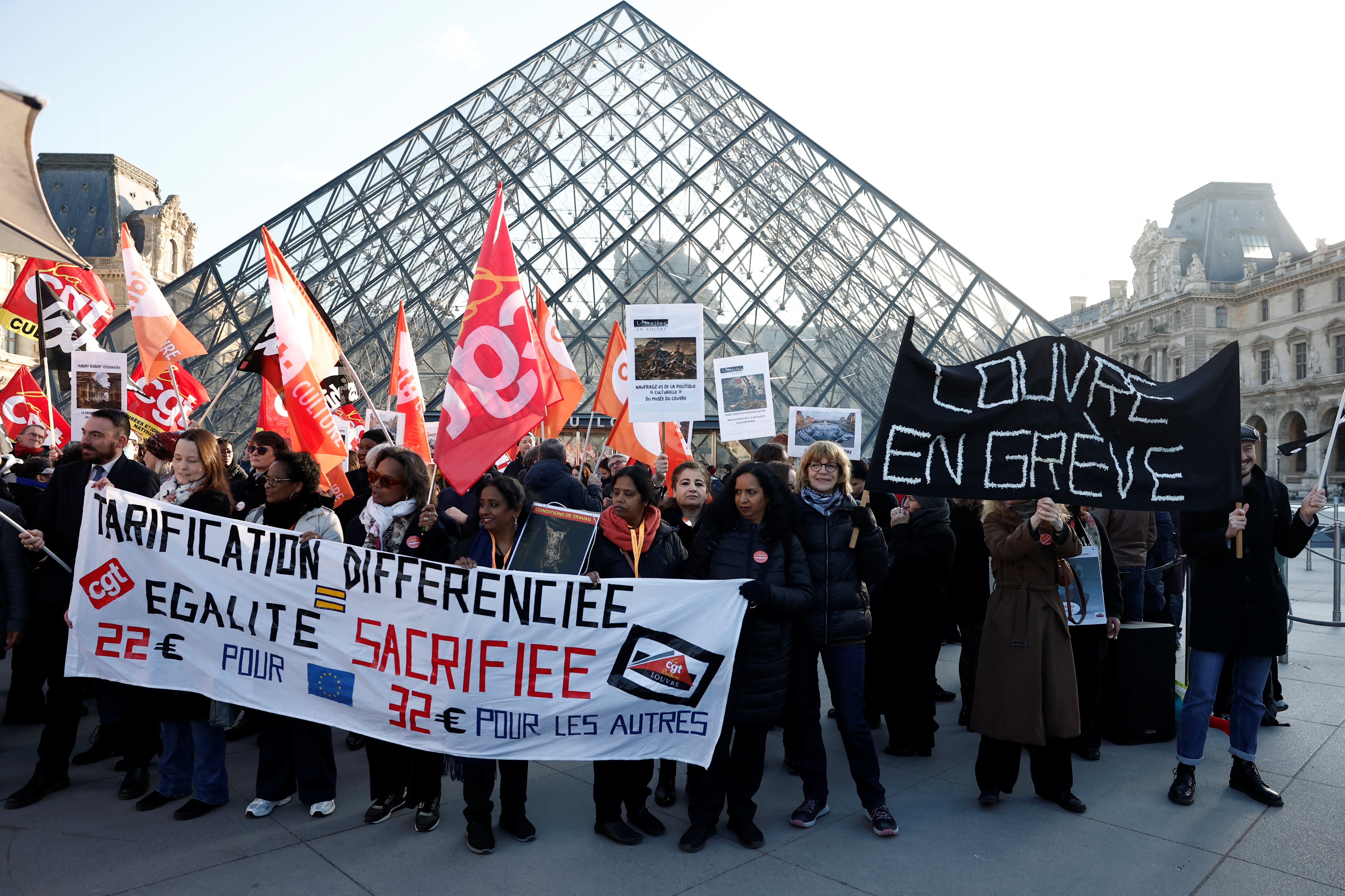 Paris Louvre museum remains closed after employees vote to strike