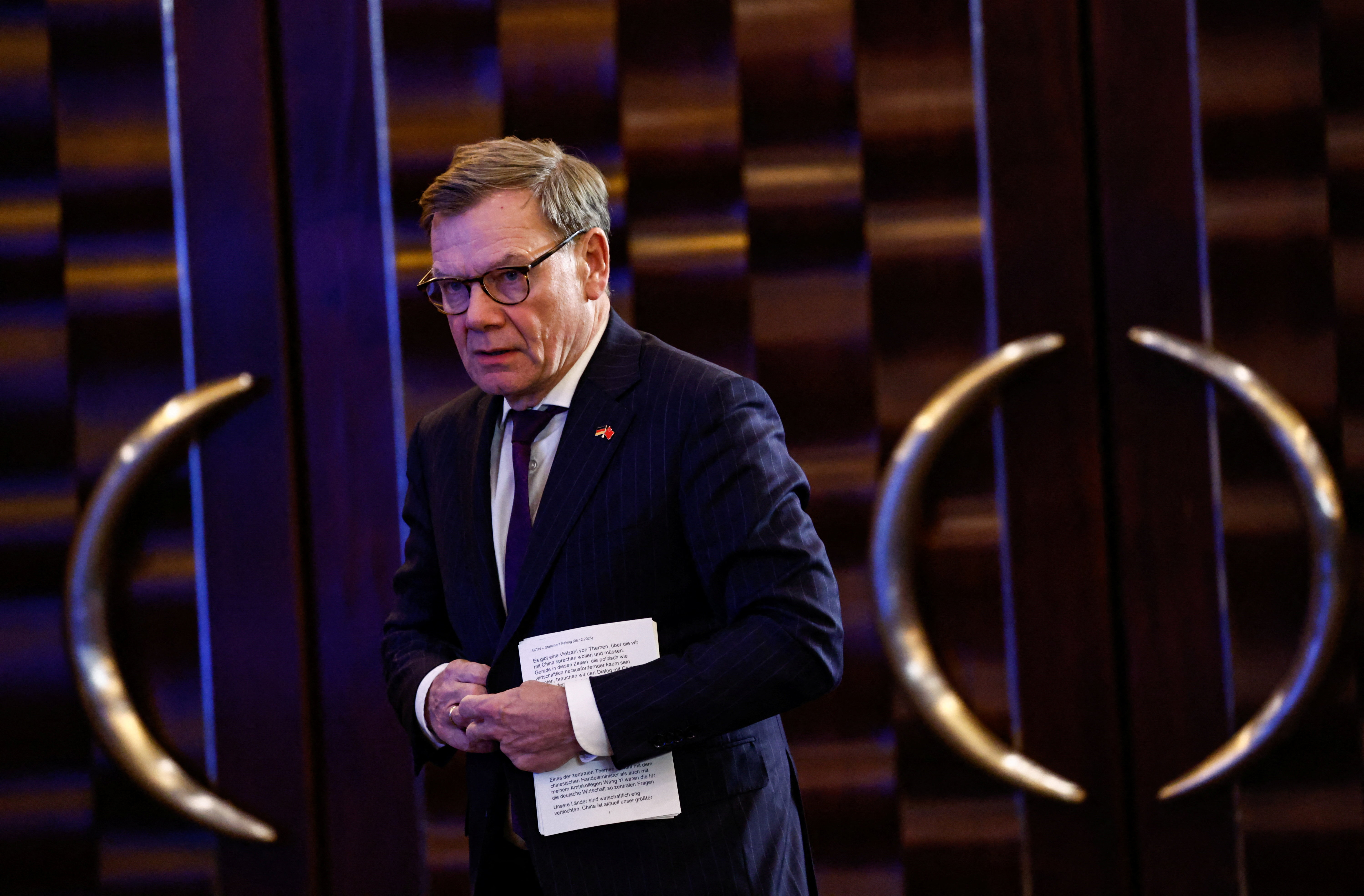 German Foreign Minister Johann Wadephul attends a press conference in Beijing
