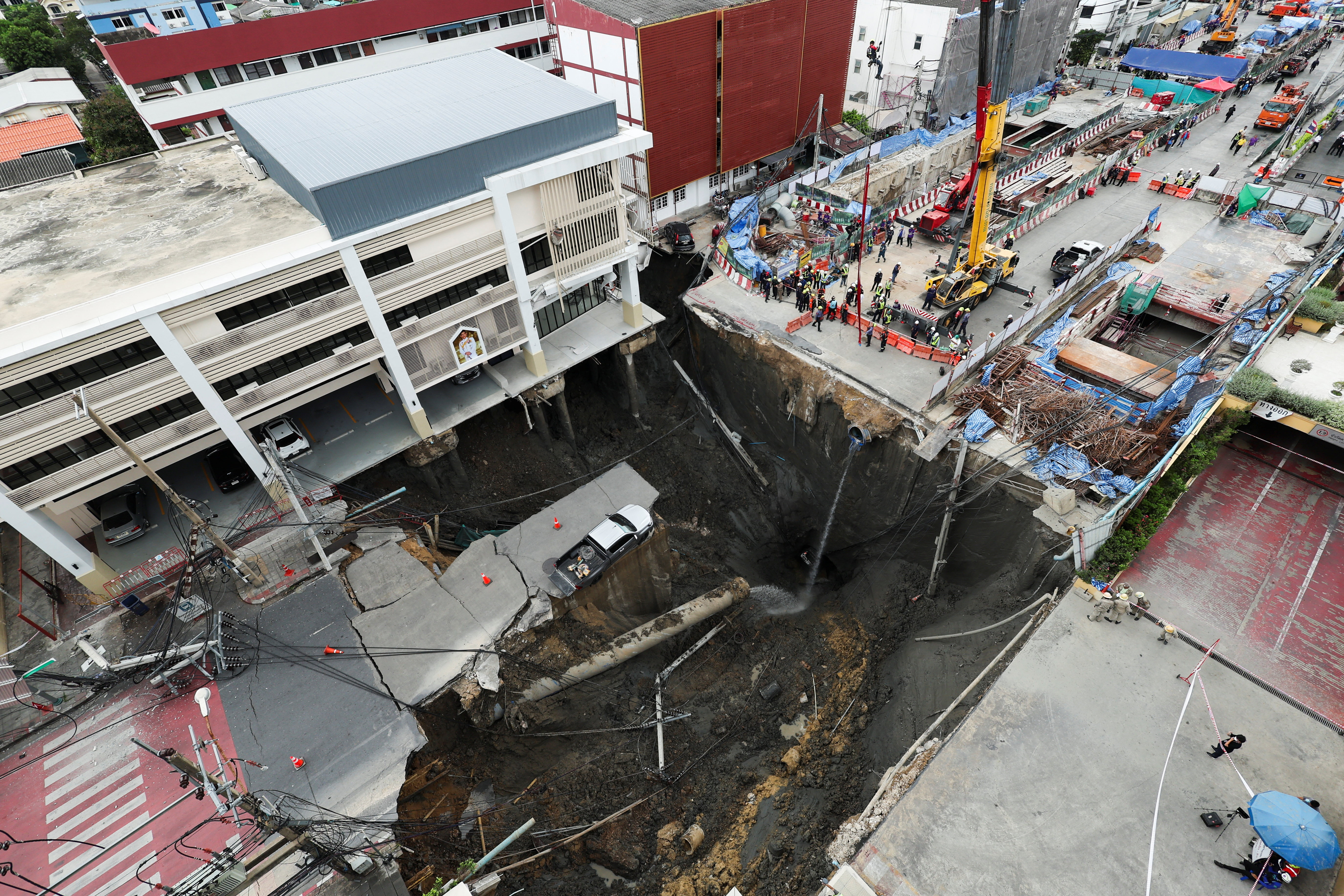 A massive sinkhole opens on Samsen Road near Vajira Hospital, in Bangkok