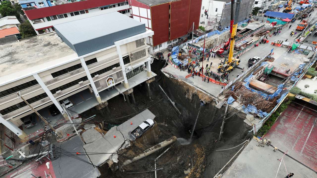A massive sinkhole opens on Samsen Road near Vajira Hospital, in Bangkok
