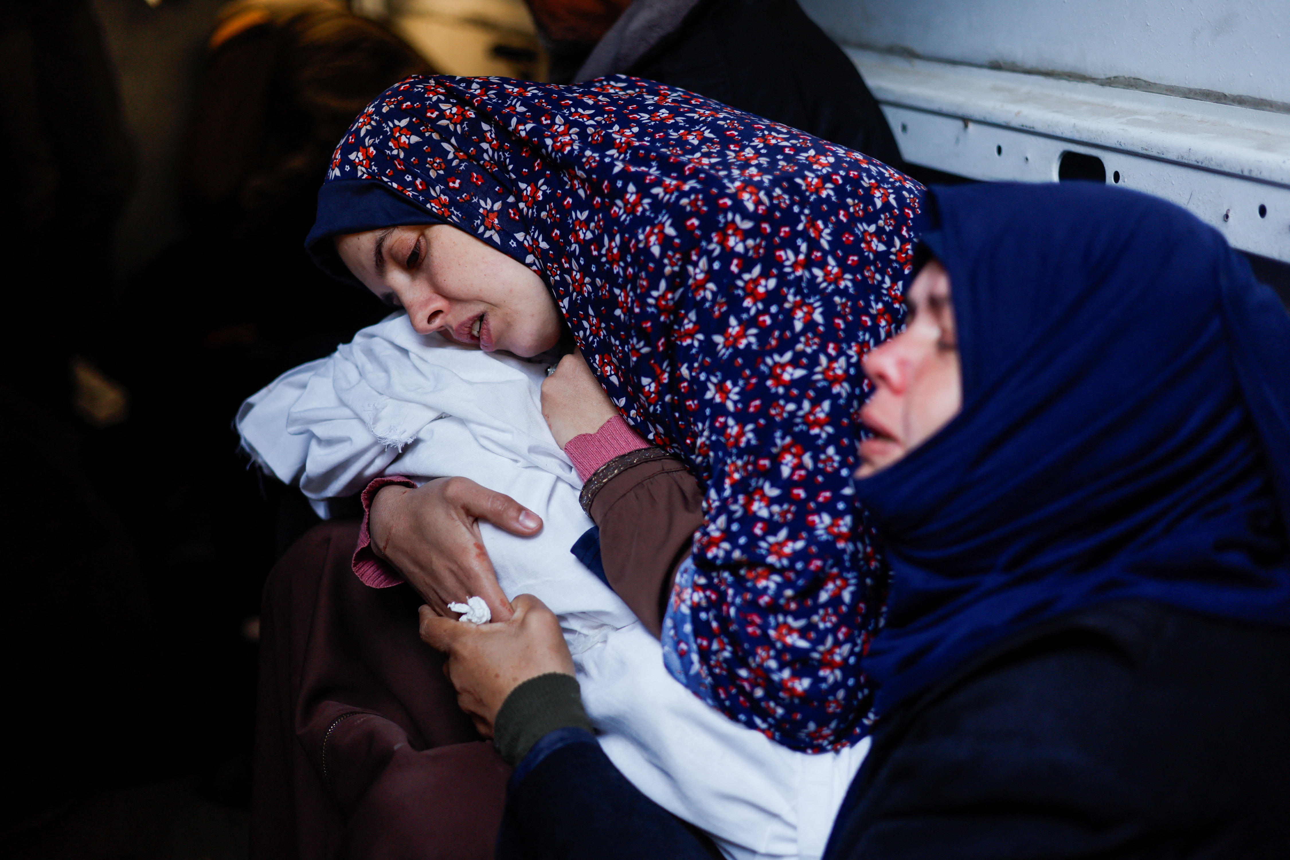 Funeral of Palestinian twins Wesam and Naeem Abu Anza, who were born during the conflict between Israel and Hamas and were killed in Israeli air strikes, in Rafah