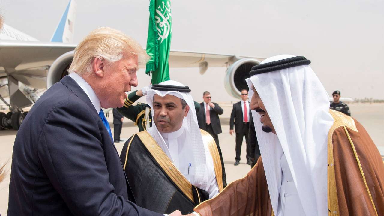 FILE PHOTO: Saudi Arabia's King Salman bin Abdulaziz Al Saud shakes hands with U.S. President Donald Trump during a reception ceremony in Riyadh