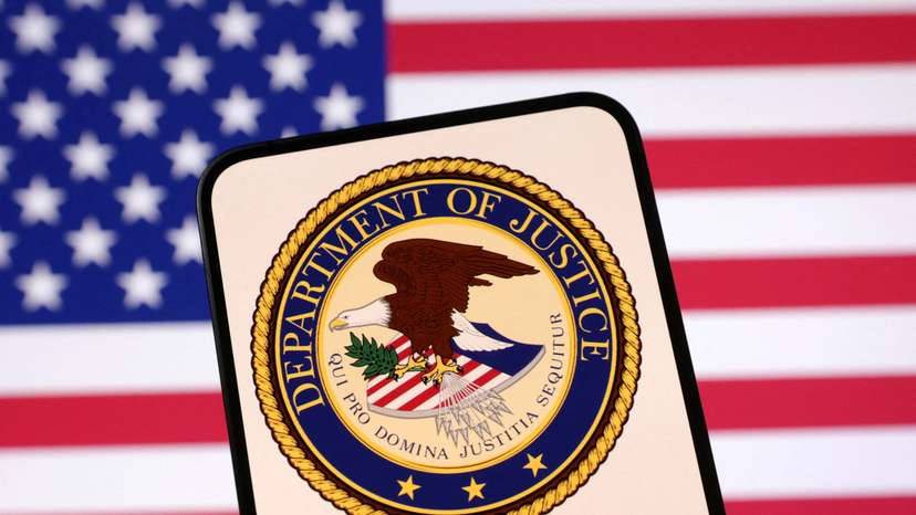 FILE PHOTO: Illustration shows United States Department of Justice logo and U.S. flag