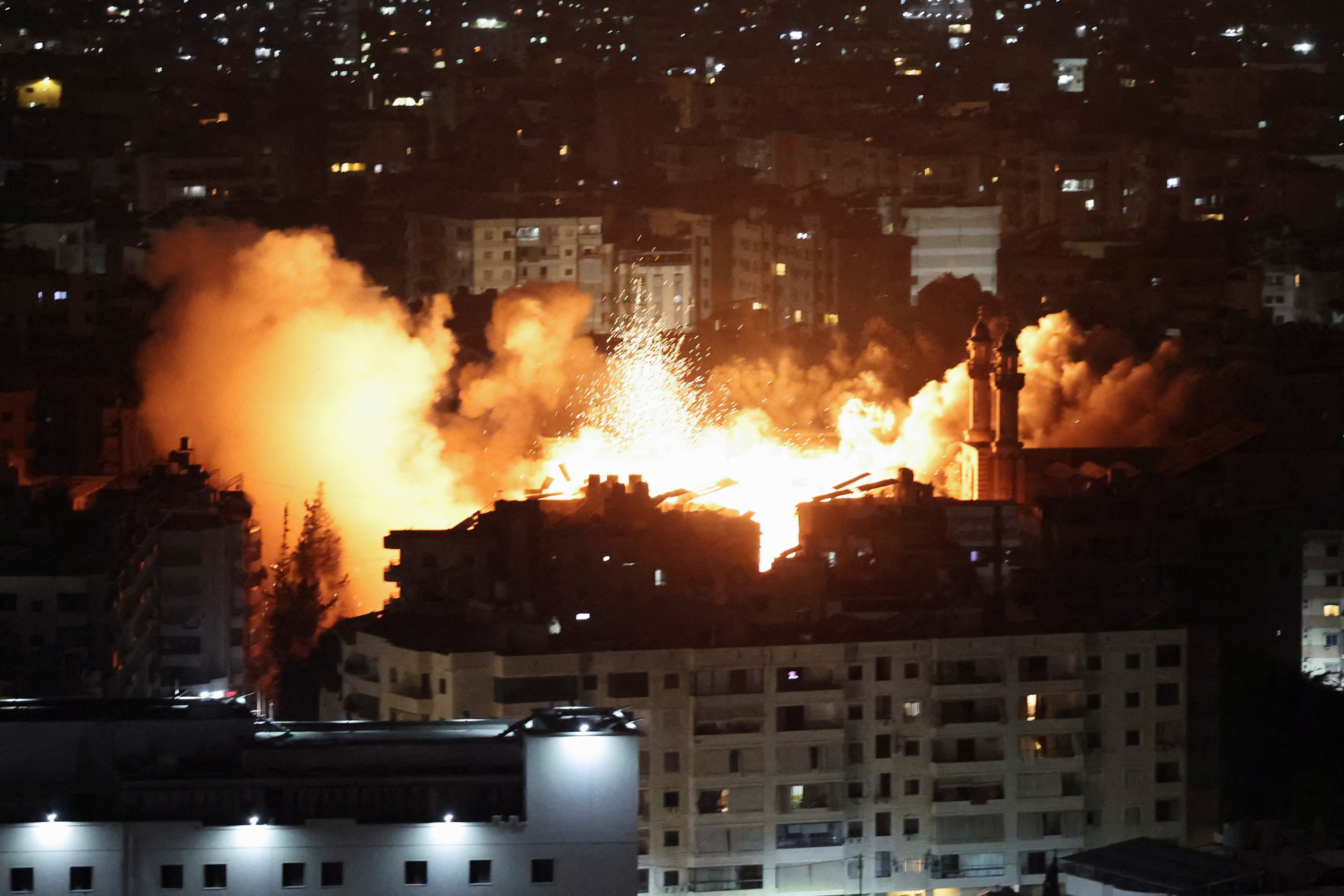 Israeli strike on Beirut's southern suburbs, after the Israeli military issued an evacuation warning for the area, as seen from Baabda