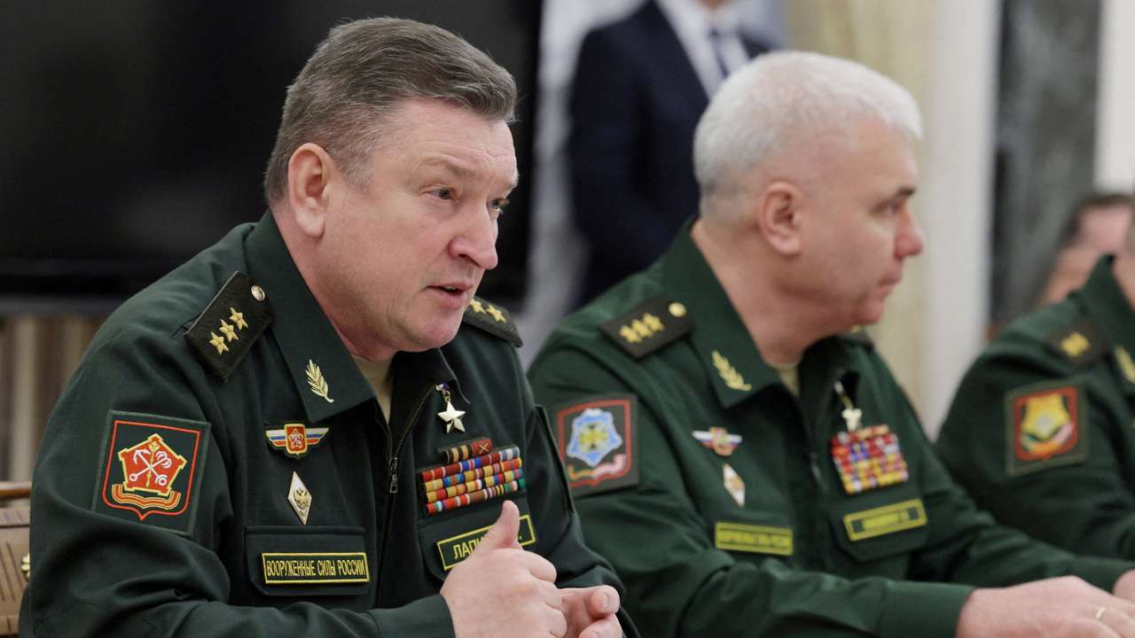FILE PHOTO: Russian President Putin meets with commanders of troops of military districts, in Moscow