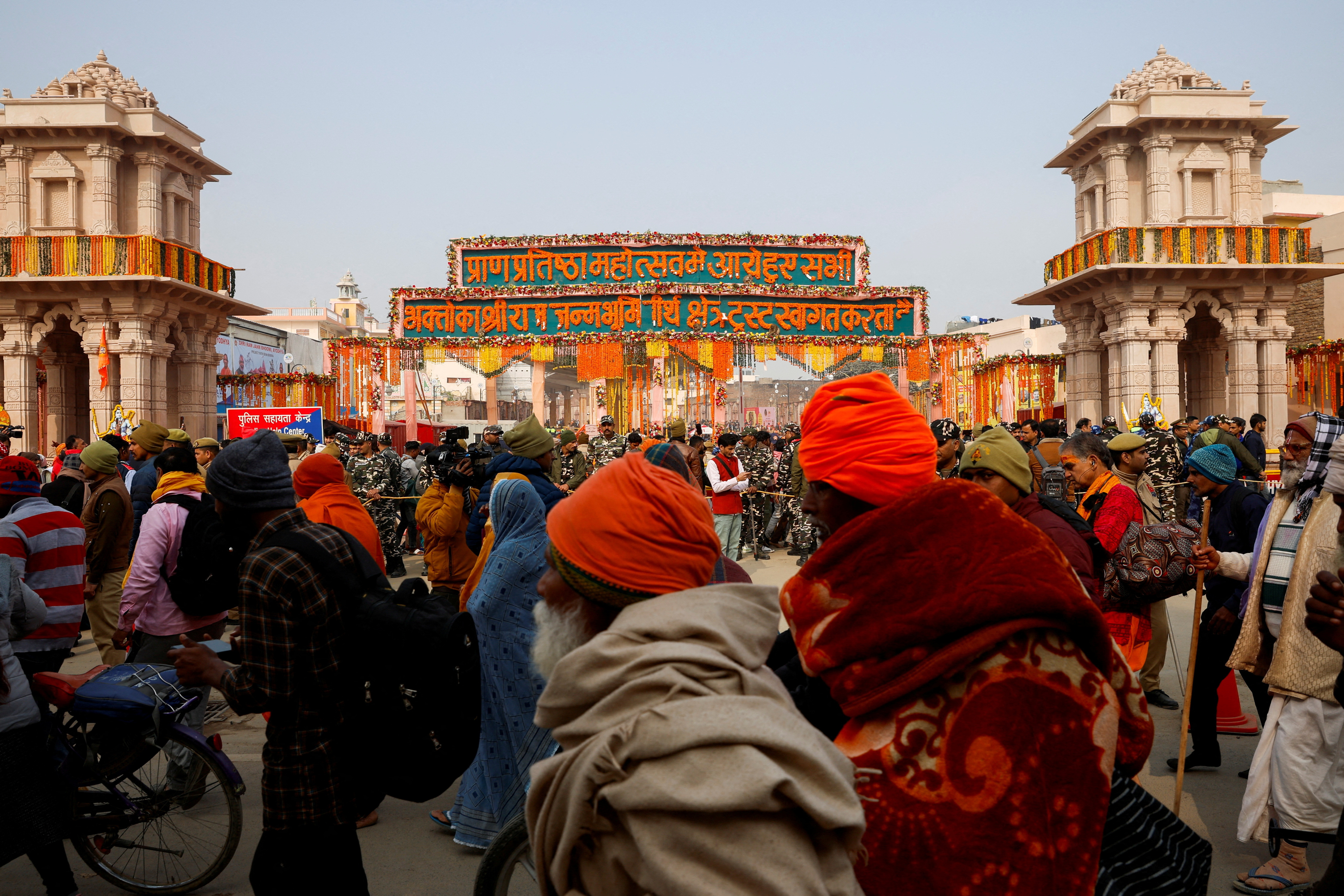 FILE PHOTO: Hindu devotees wait to enter the Hindu god Lord Ram temple after its inauguration in Ayodhya