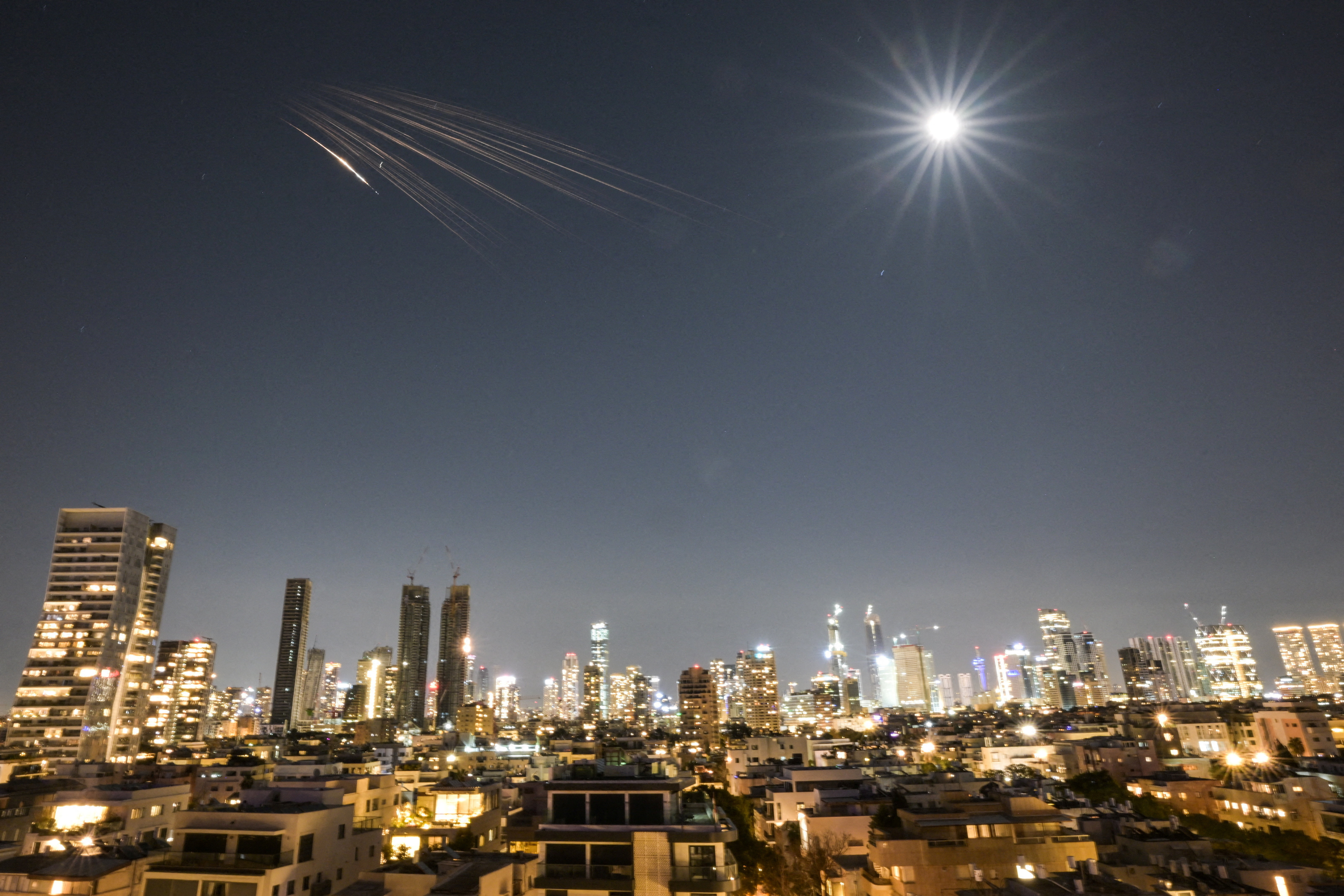 An Iranian missile with cluster munitions flies towards Israel, amid the U.S.-Israeli conflict with Iran, in central Israel