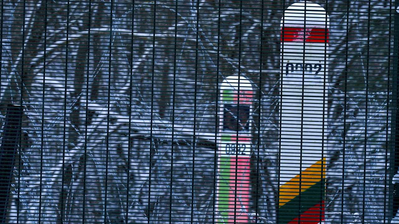 FILE PHOTO: A view of Belarus-Lithuania border mark poles in Kurmelionys