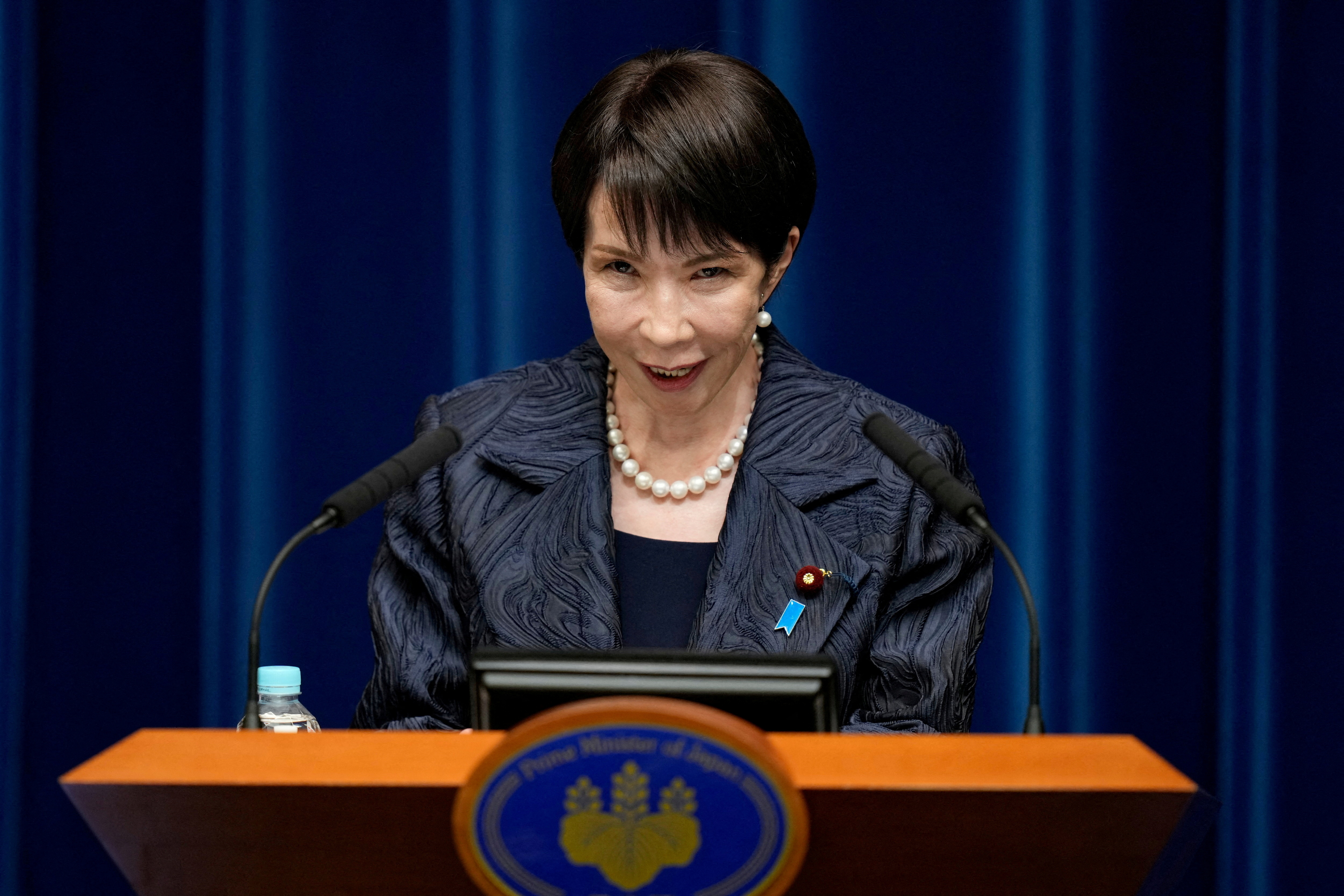 FILE PHOTO: Japan's new PM Takaichi speaks during a press conference in Tokyo