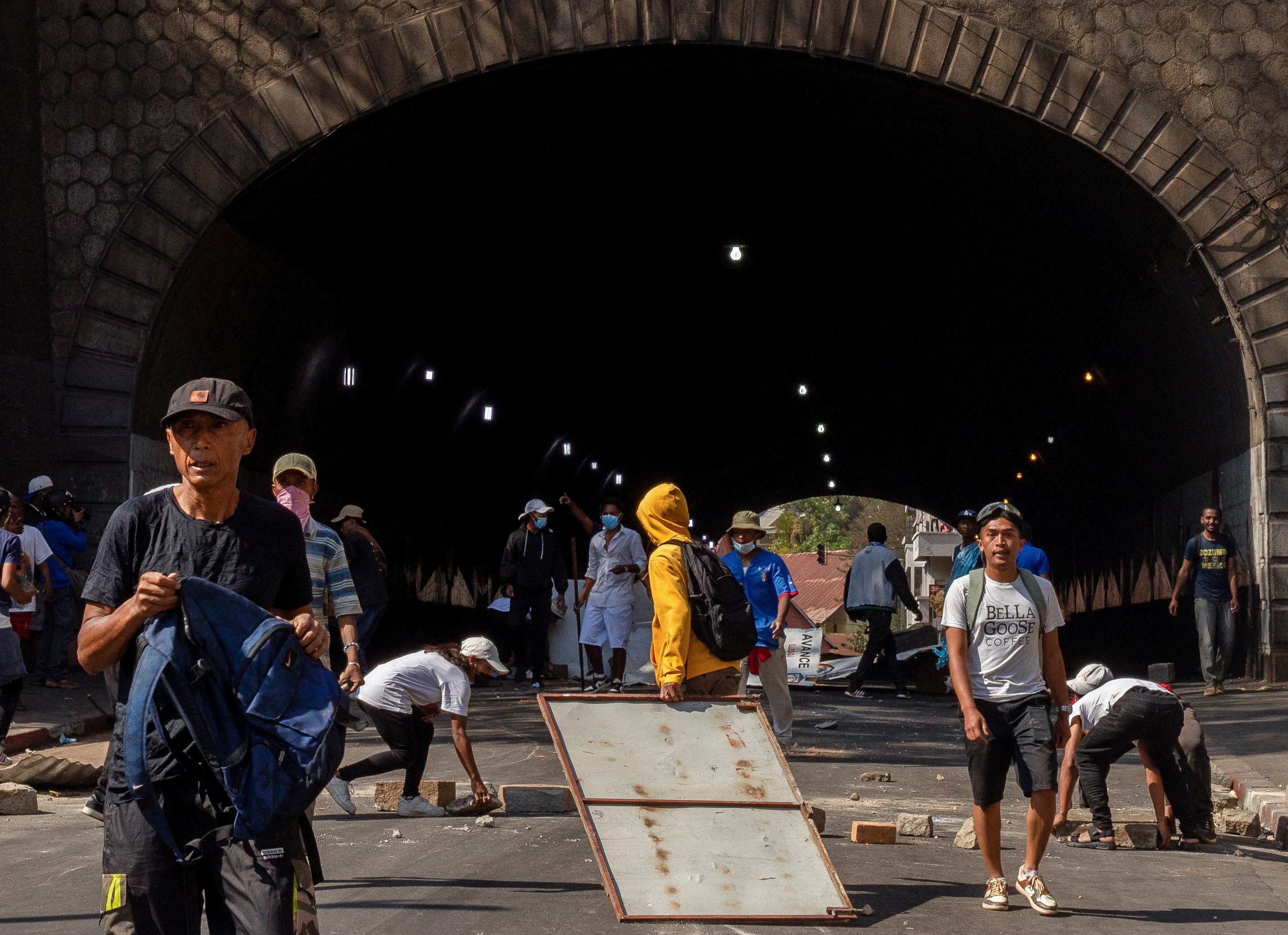 Protesters erect a barricade during a demonstration to denounce frequent power outages and water shortages in Antananarivo