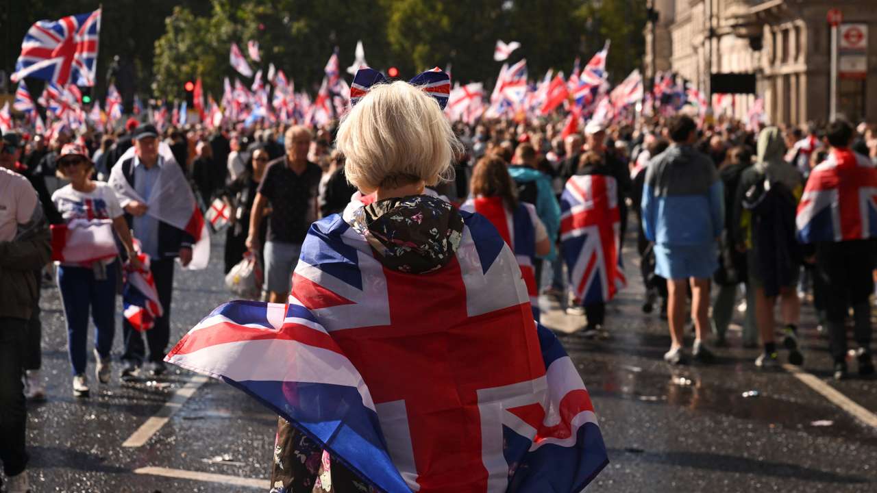 Protesters gather on the day of an anti-immigration rally organised by British anti-immigration activist Stephen Yaxley-Lennon, also known as Tommy Robinson in London