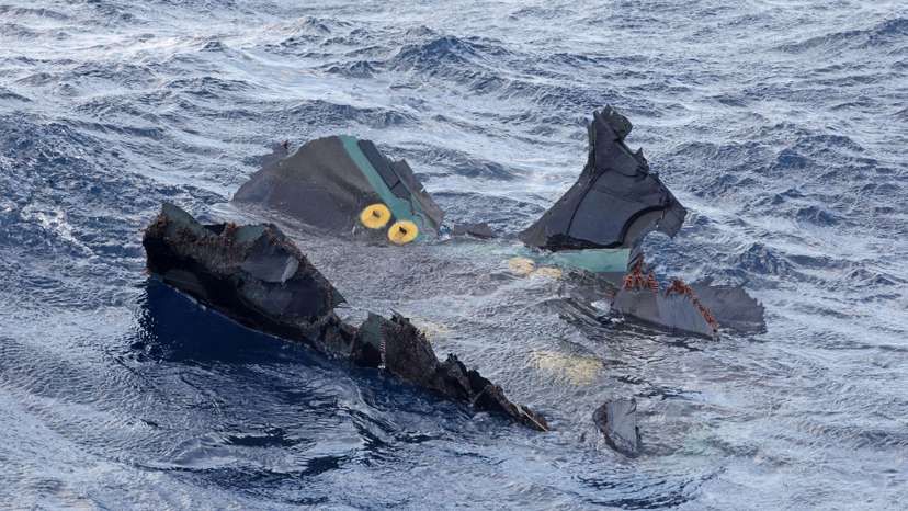 A floating object believed to belong to the U.S. military aircraft V-22 Osprey that crashed into the sea is seen off Yakushima Island