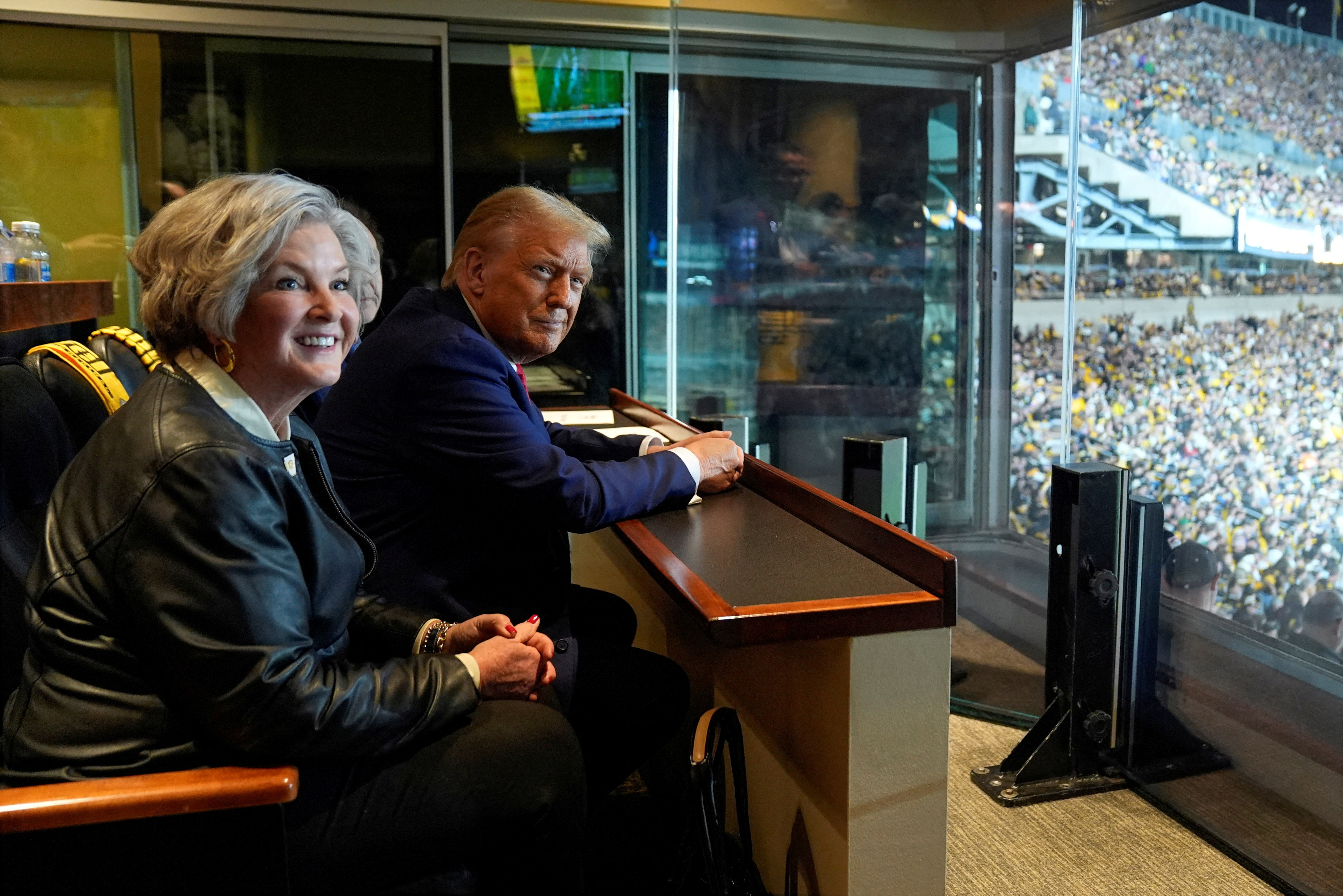 FILE PHOTO: Trump attends the New York Jets football game against the Pittsburgh Steelers, in Pittsburgh