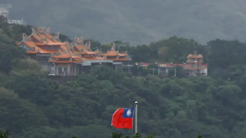 A Taiwan flag flutters in Keelung, as China conducts "Justice Mission 2025" military drills around Taiwan