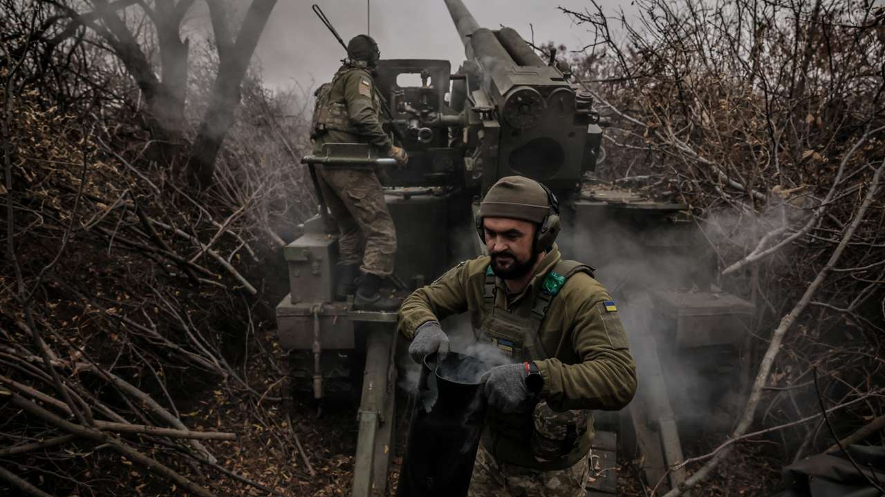 Ukrainian servicemen fire a self-propelled howitzer towards Russian troops near the frontline town of Chasiv Yar