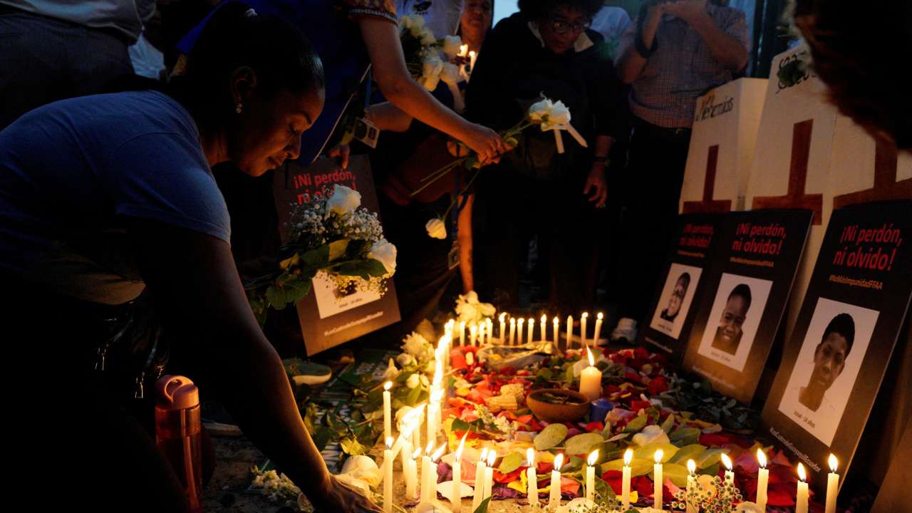 Family members and supporters attend a vigil on the one-year anniversary of the disappearance of four boys who were later found dead, in the Las Malvinas neighbourhood in Guayaquil, Ecuador, December 8, 2025. REUTERS/Santiago Arcos