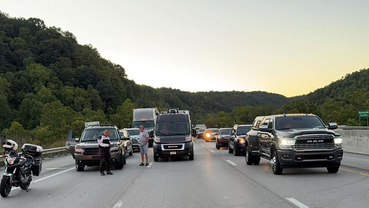 Drivers park on the the lanes of the I-75 highway after reports of multiple people shot in Kentucky
