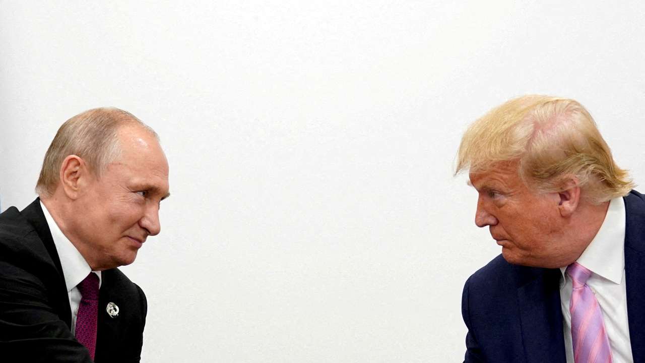 FILE PHOTO: U.S. President Donald Trump and Russian President Vladimir Putin at G20 leaders summit in Osaka