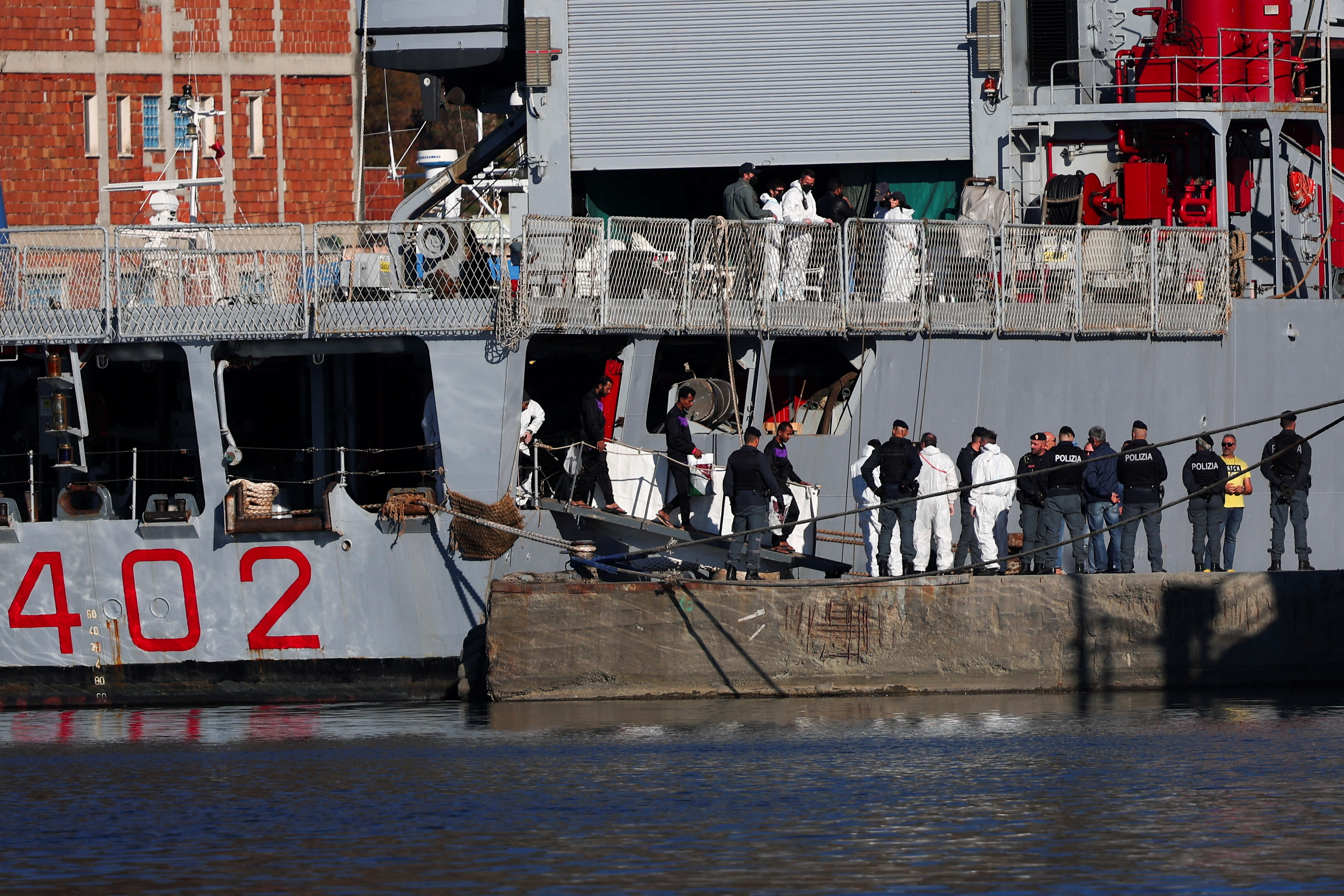 Italian navy ship Libra carrying migrants arrives in Shengjin