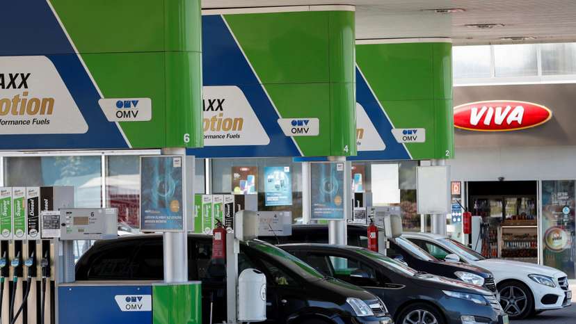 FILE PHOTO: Cars at an OMV petrol station near the Slovakian border in Esztergom
