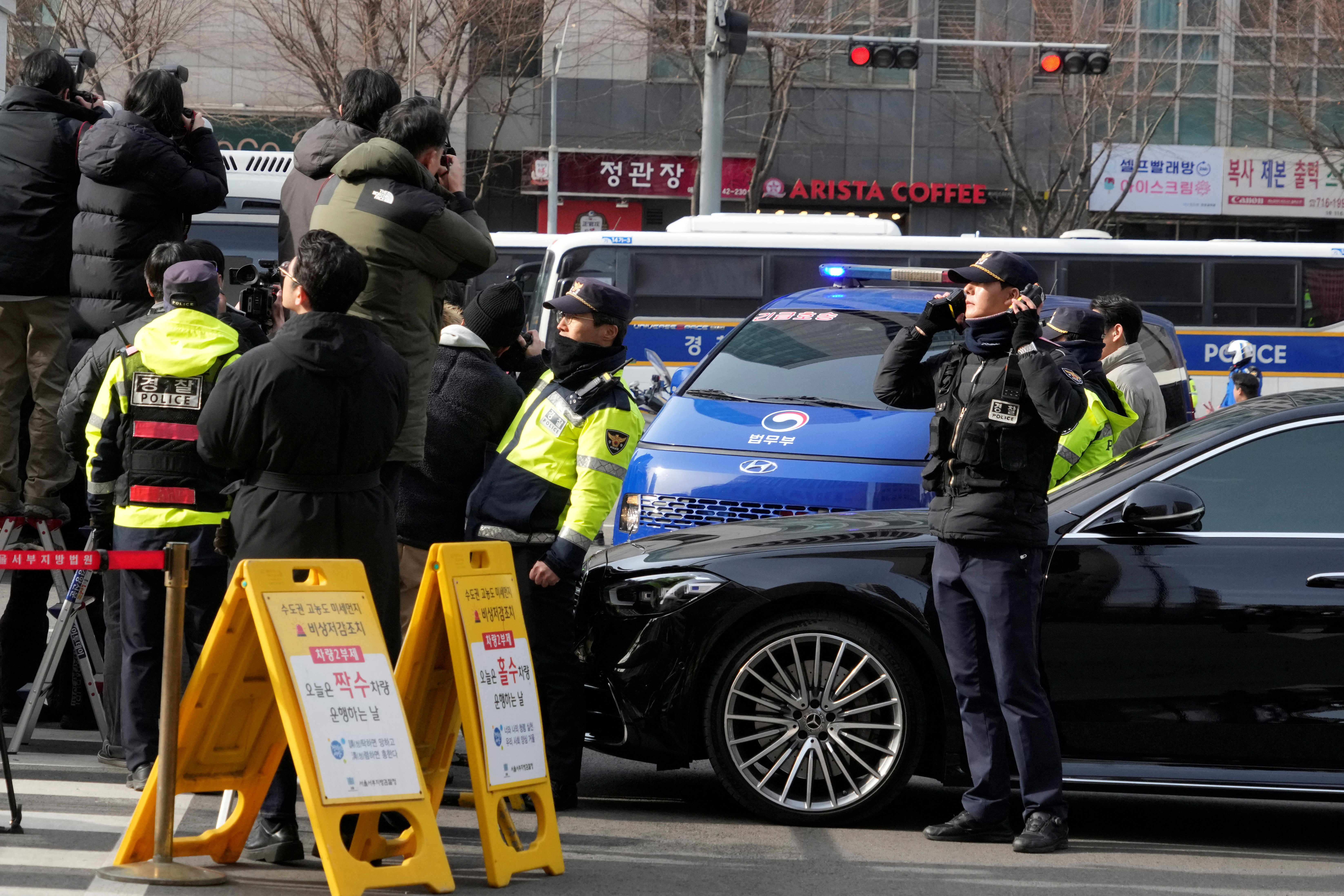 Impeached South Korean President Yoon Suk Yeol arrives at Seoul Western District Court in Seoul