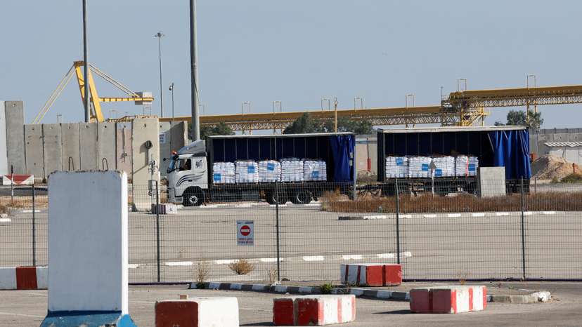 A truck carrying aid is parked at the Kerem Shalom crossing between Israel and Gaza, before going into Gaza, on the Israeli side of the Israel-Gaza border